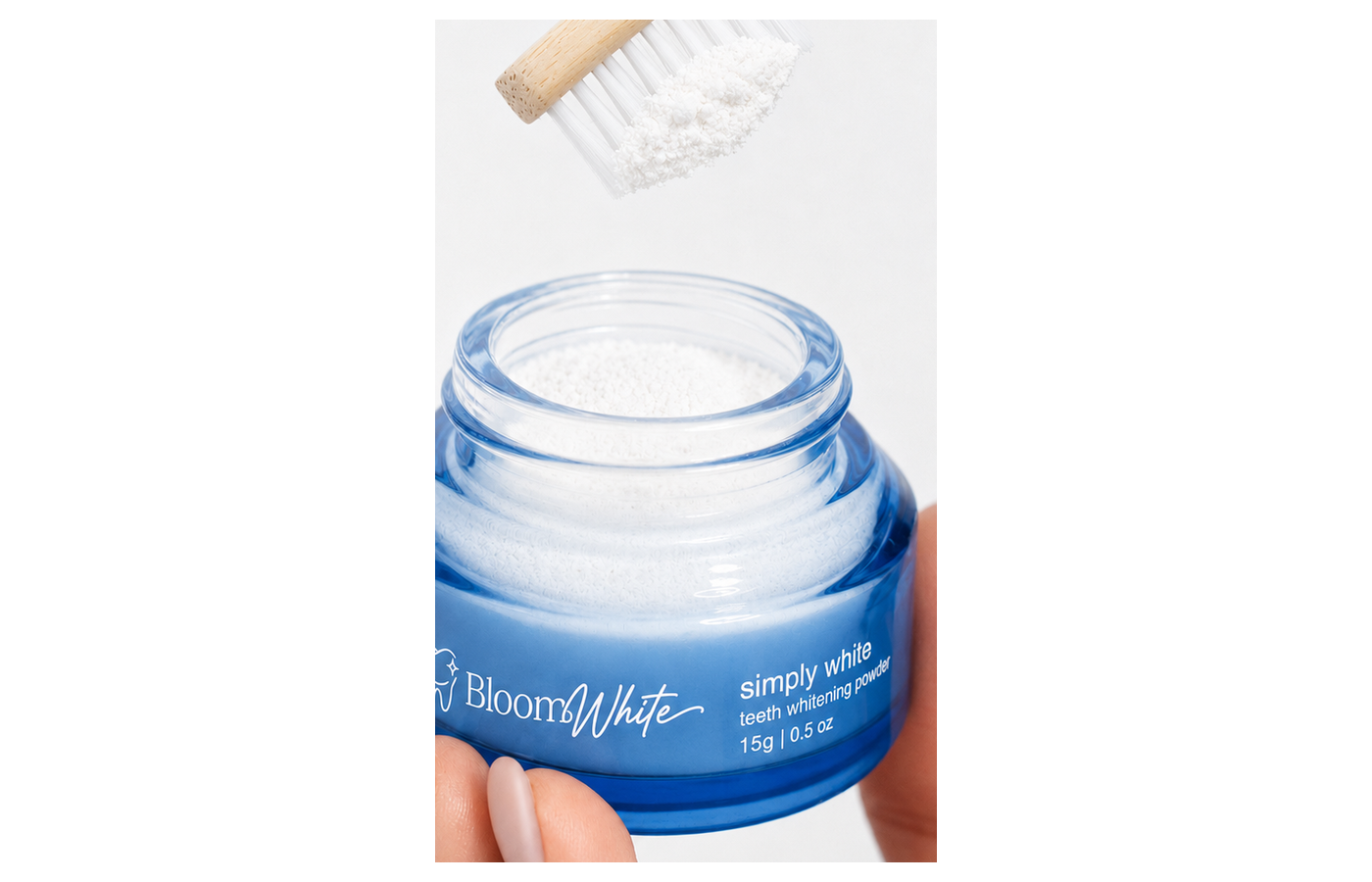 Bloom White open powder jar with toothbrush application